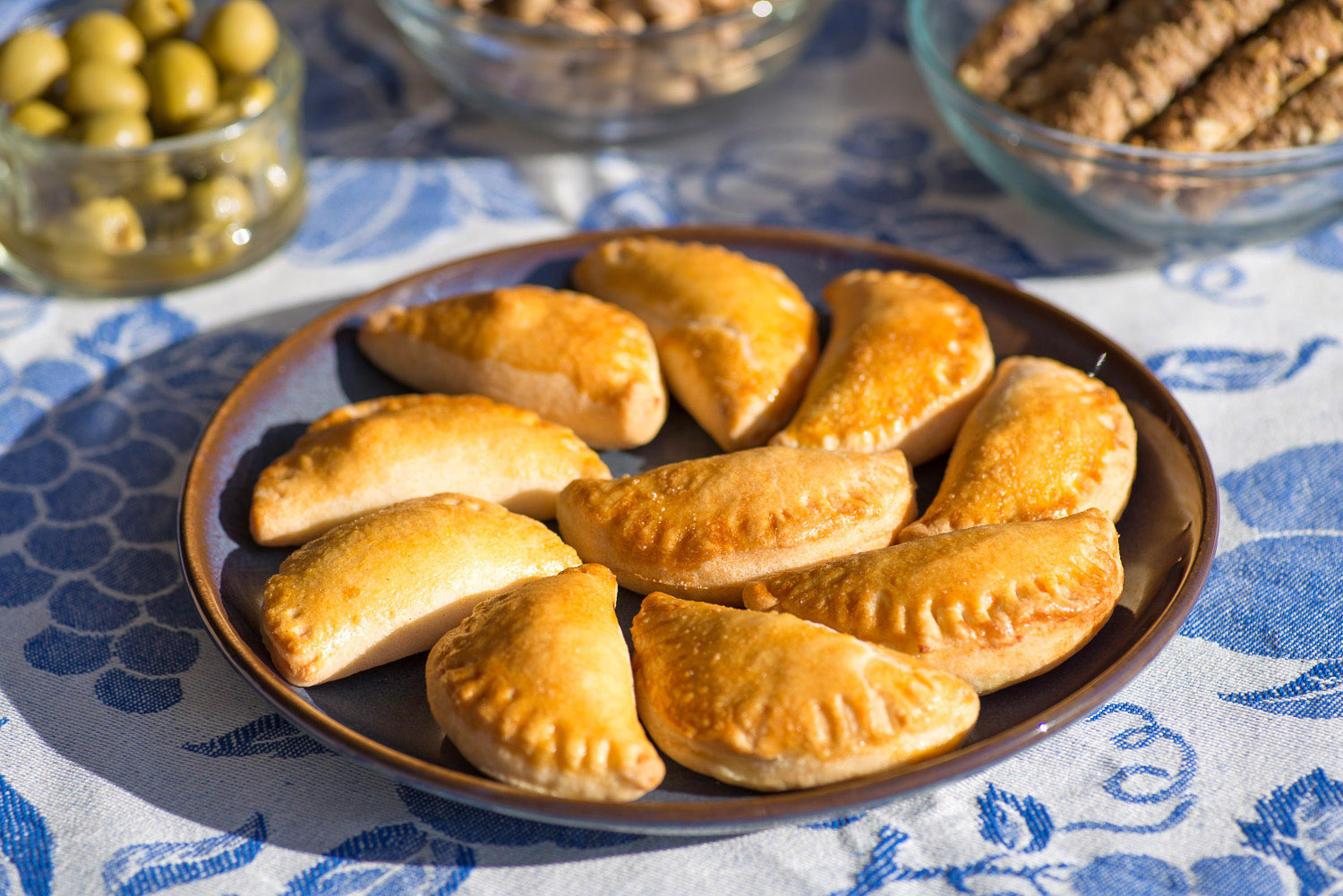 a plate full of Greek cheese pies tiropitakia