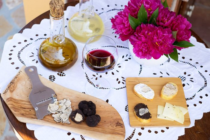 Black truffles and cheese on a table. Food tasting in Istria Croatia