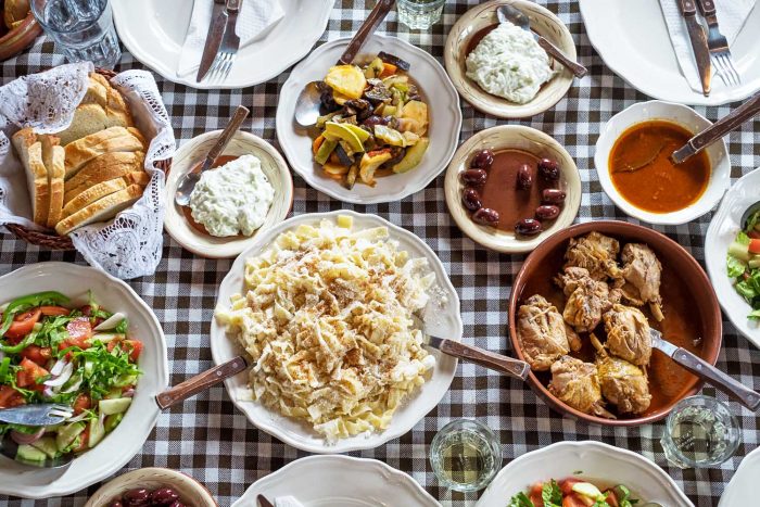 A table full of home cooked Greek food