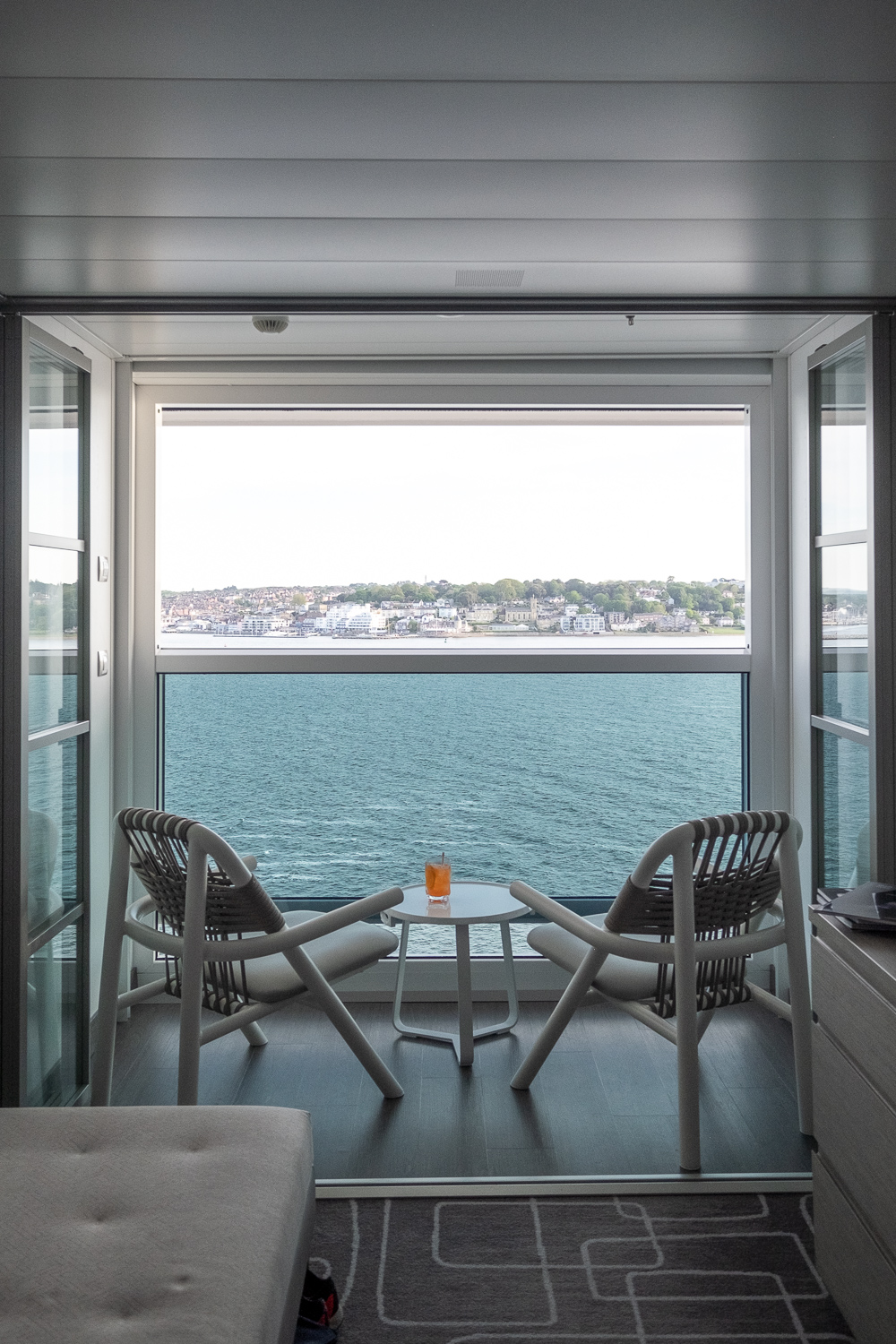 the view of the sea from a cabin in the Celebrity Edge cruise ship by Celebrity Cruises