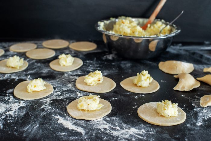 Pierogi Ruskie: vegetarian Polish dumplings with potatoes & cheese | Recipe from Wild Honey and Rye cookbook by Ren Behan | #mondomulia
