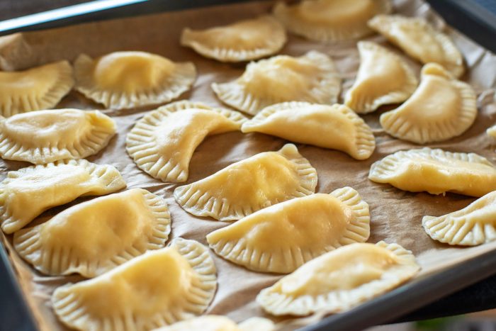 Pierogi Ruskie: vegetarian Polish dumplings with potatoes & cheese | Recipe from Wild Honey and Rye cookbook by Ren Behan | #mondomulia