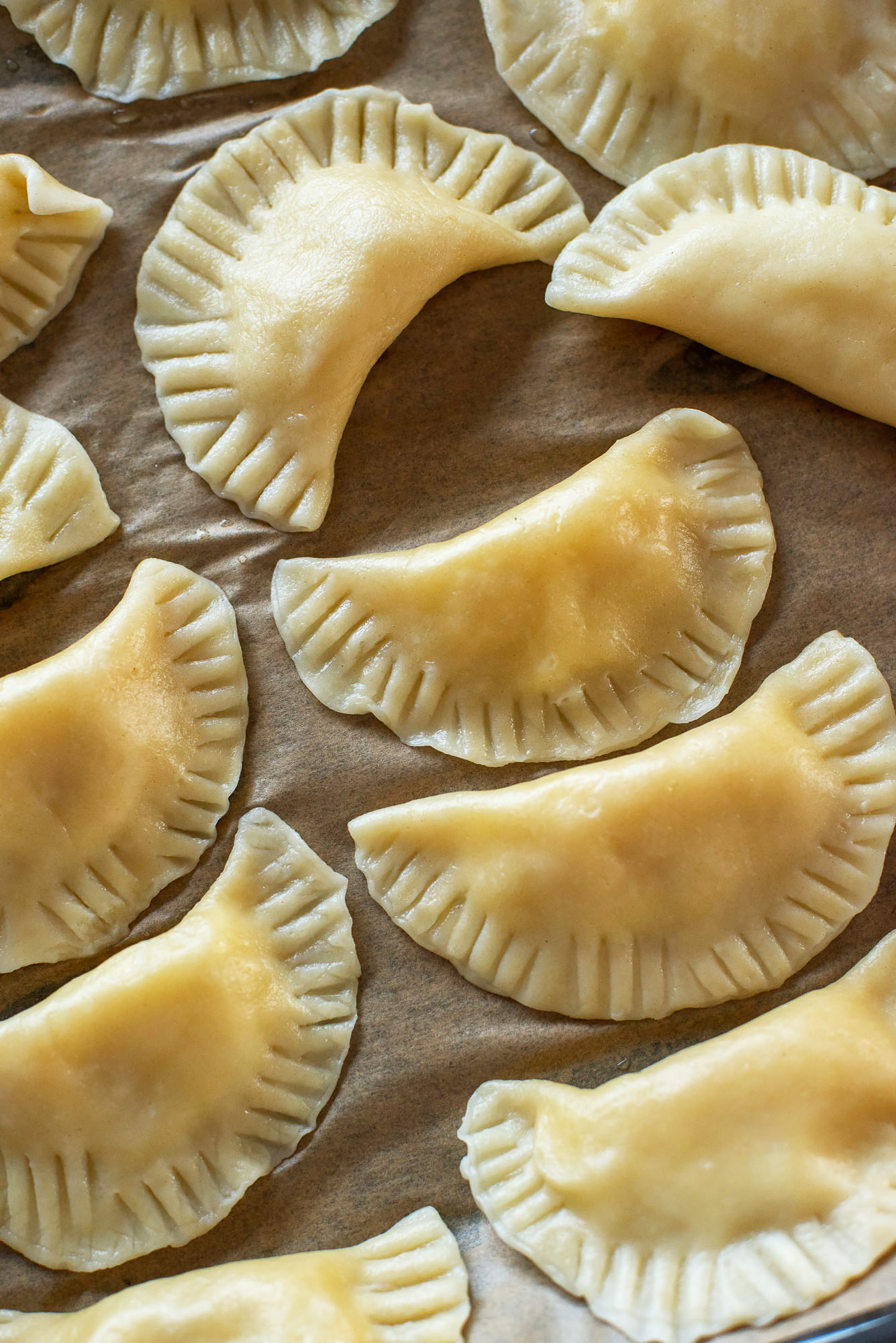 Pierogi Ruskie: vegetarian Polish dumplings with potatoes & cheese | Recipe from Wild Honey and Rye cookbook by Ren Behan | #mondomulia