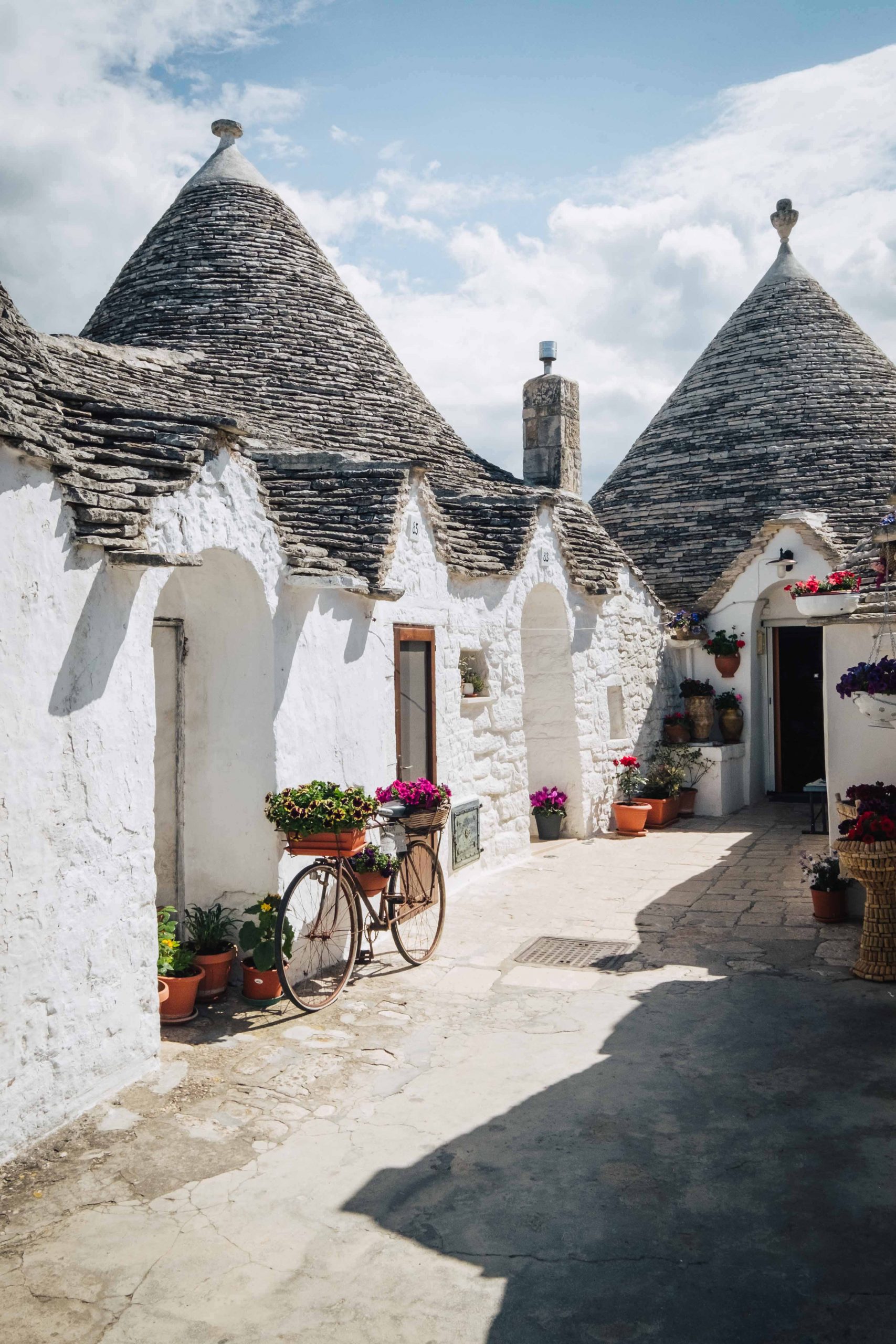 Trulli houses in Rione Aia Piccola, part of the Unesco Heritage Site of Alberobello in Valle d'Itria | A 7-day Road Trip Through Puglia | Mondomulia