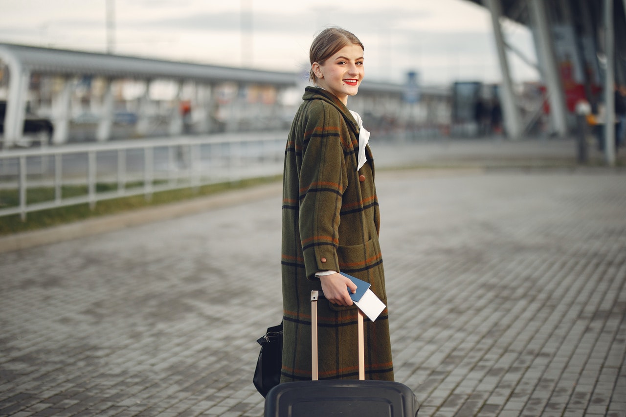 Woman travelling with suitcase