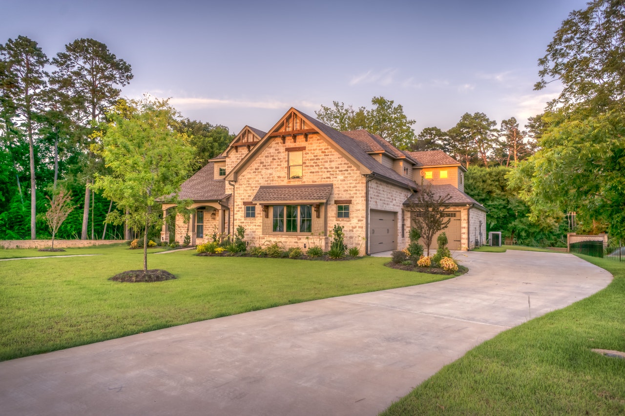 Brown Brick House Beside Trees