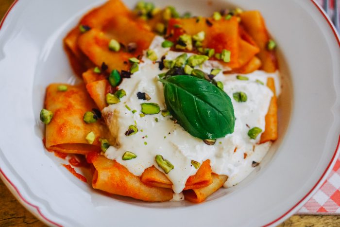 Pasta with tomato sauce and burrata cheese