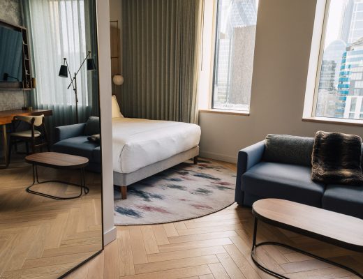 Bedroom at Canopy by London City Hilton Hotel
