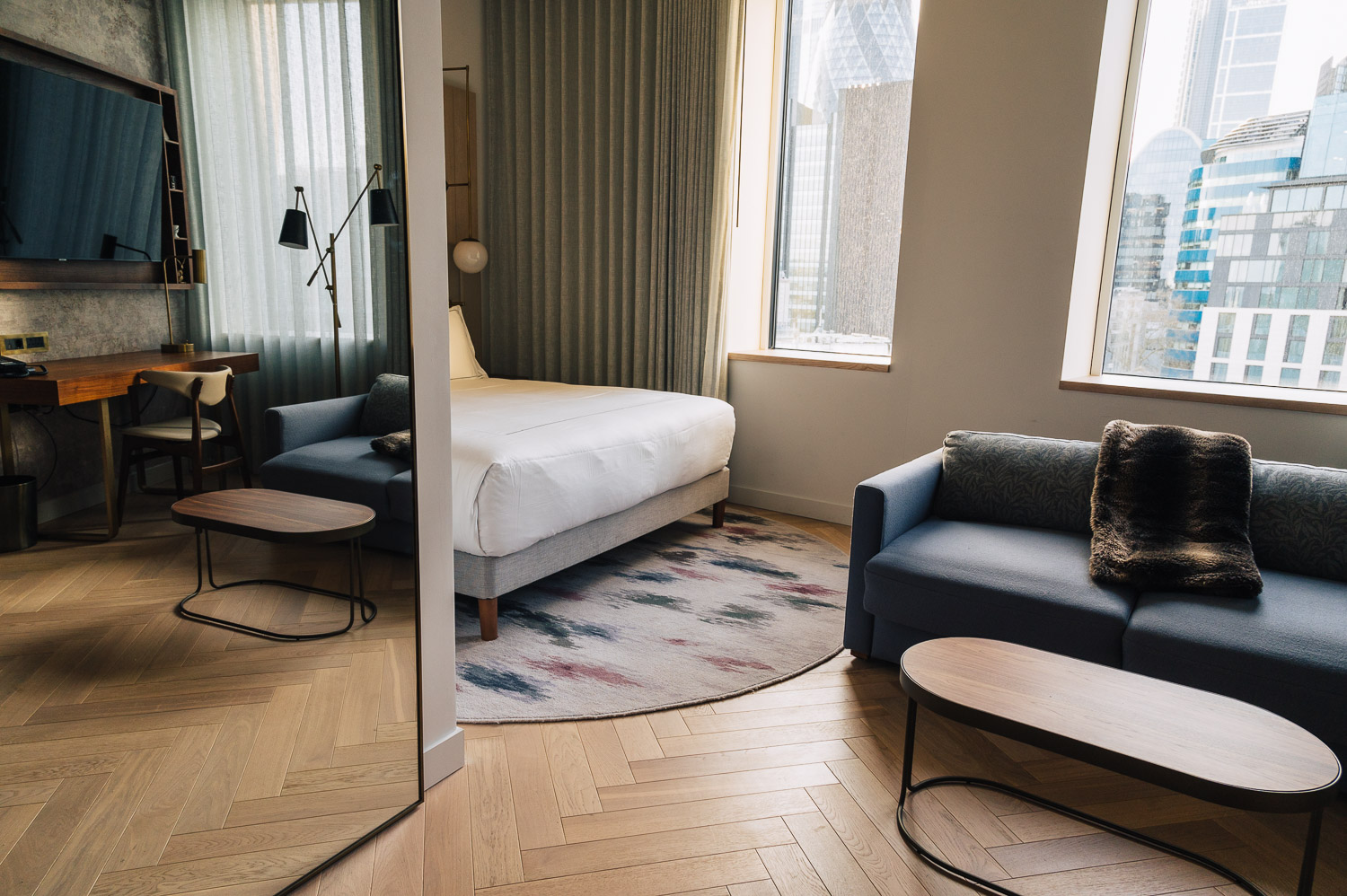 Bedroom at Canopy by London City Hilton Hotel