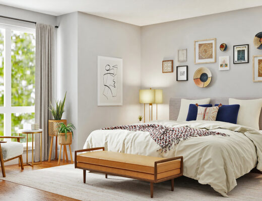spacious bedroom with double bed, window, wooden furniture, frames on the wall and white bed cover