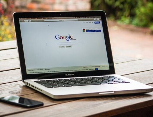 Google search engine page on the screen of a Macbook Pro laptop