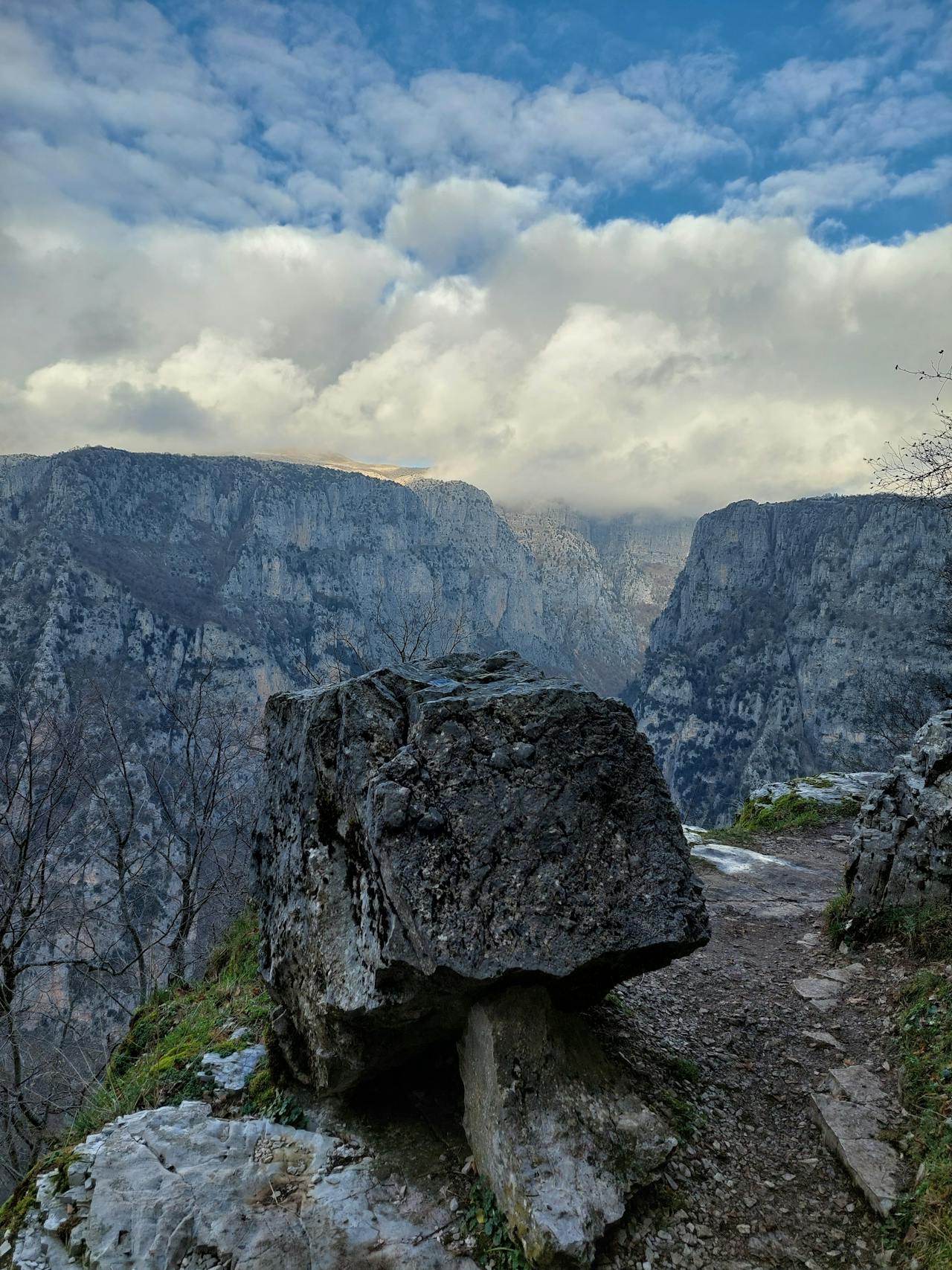 clouds over rocks in mountains in greece