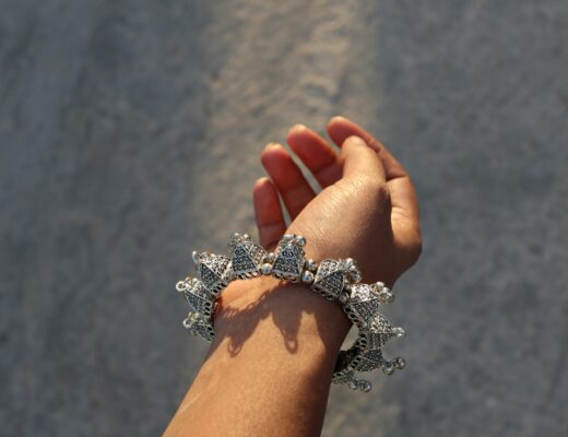 Woman wearing a traditional silver bracelet in Jaipur, India
