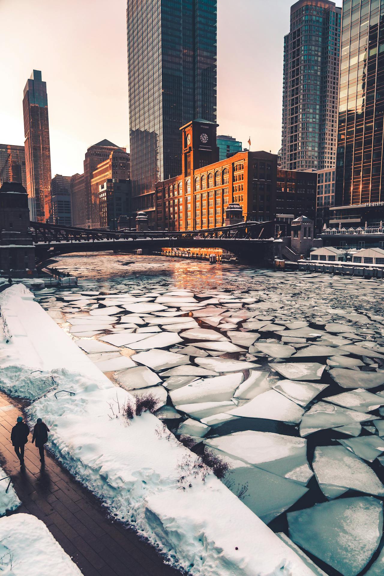 urban city and icy river in winter in Chicago urban city and icy river in winter in Chicago