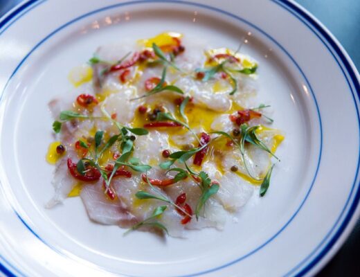 a plate of Peruvian ceviche raw fish
