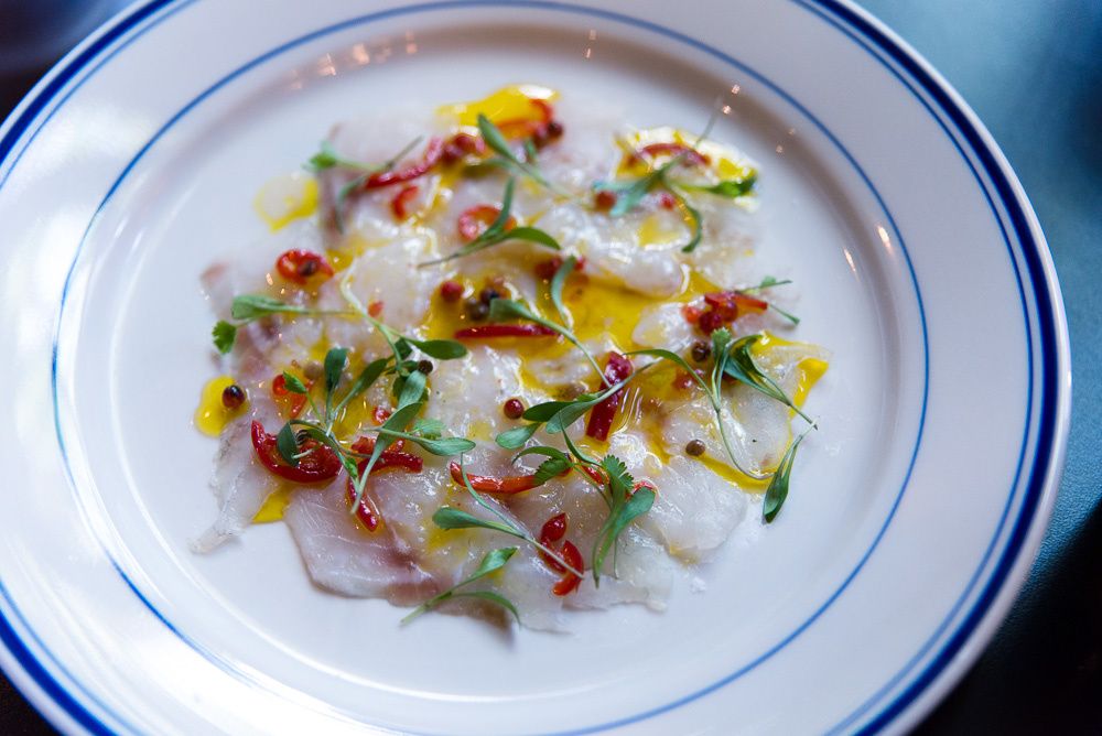 a plate of Peruvian ceviche raw fish