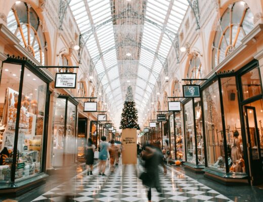 person walking inside shopping arcade in Christmas time in Melbourne