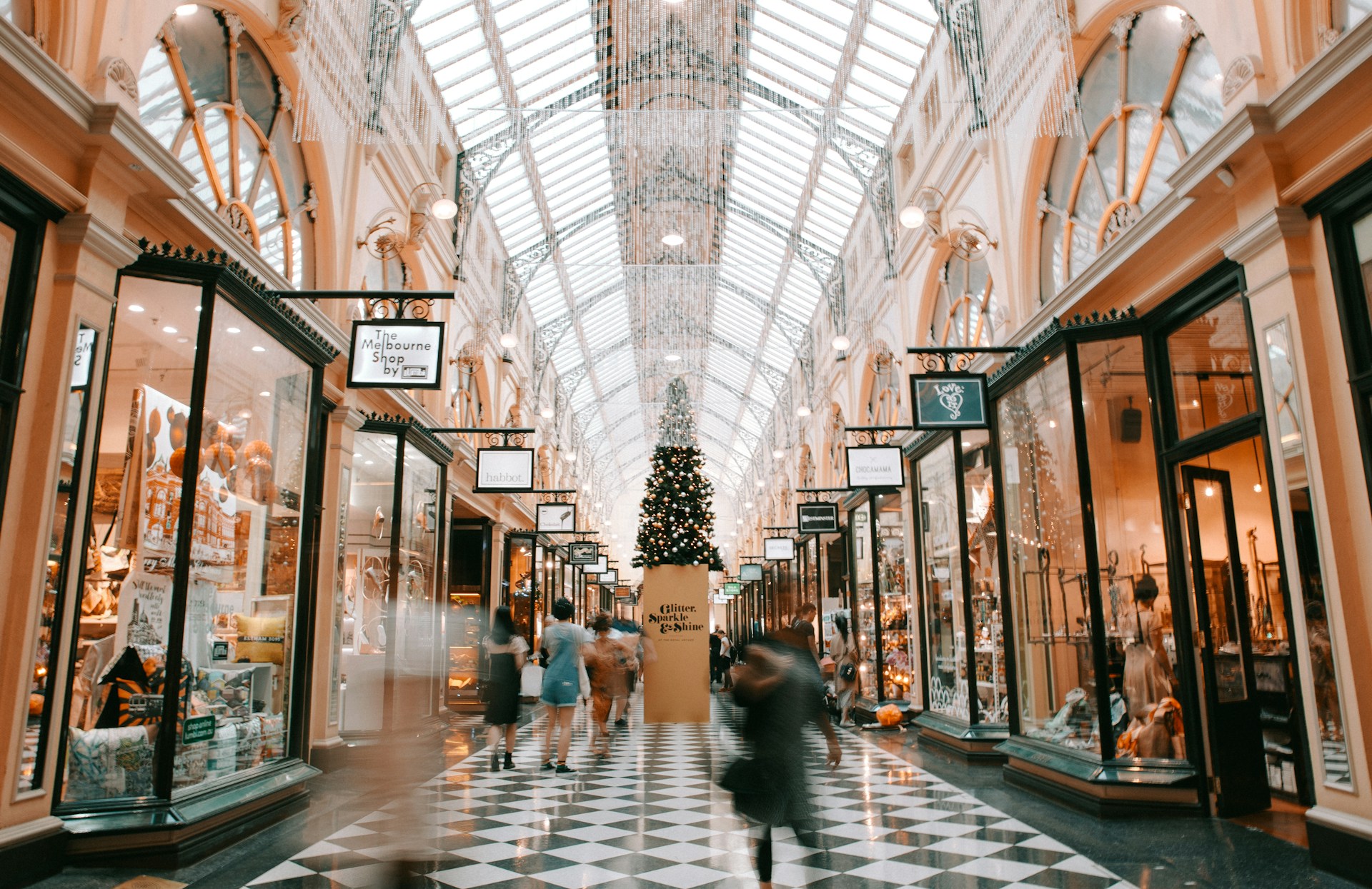 person walking inside shopping arcade in Christmas time in Melbourne
