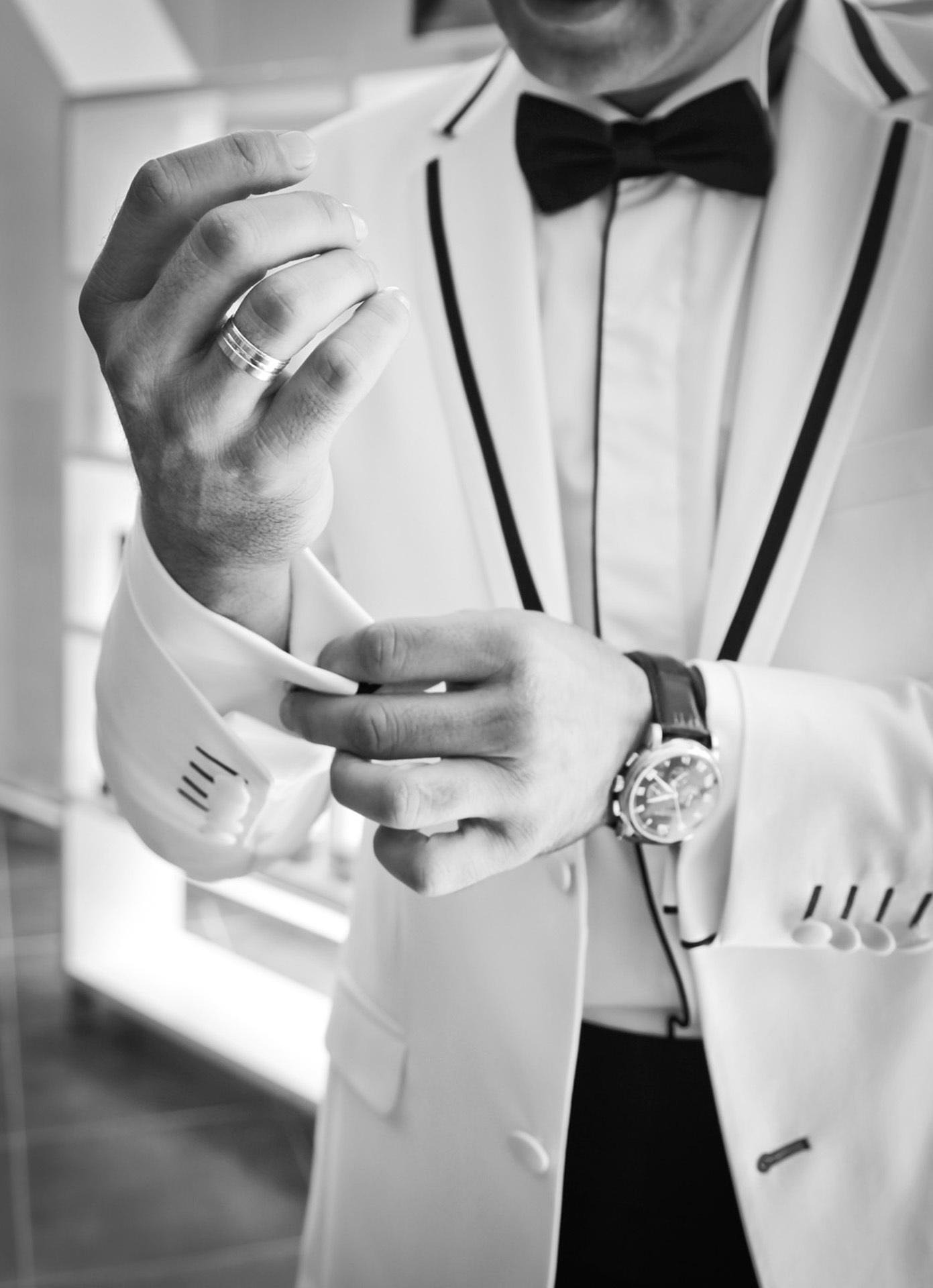 Man at wedding with ring on right hand