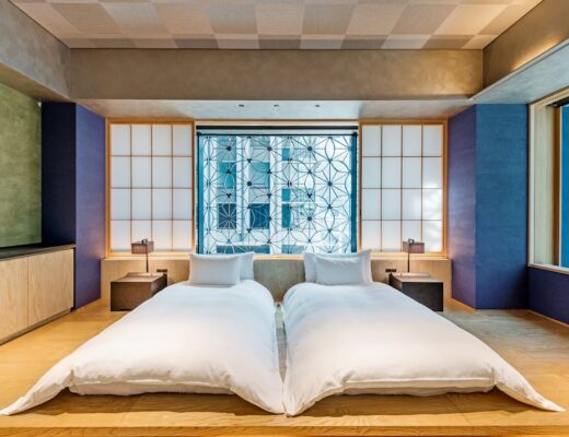 Single Beds Inside a Hotel Room