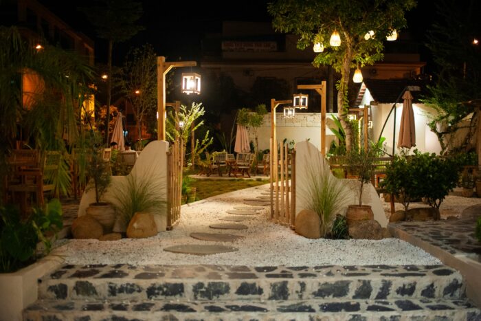 charming outdoor garden dining area at night