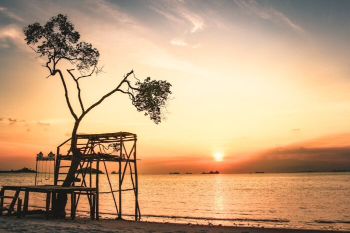 beautiful sunset view from a beach on a island in indonesia beautiful sunset view from a beach on a island in indonesia