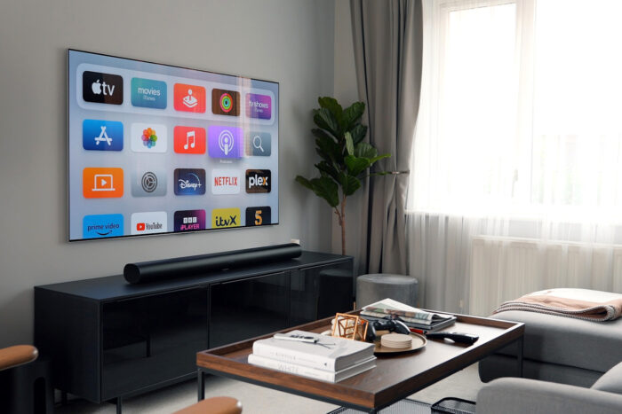 a living room with a large flat screen TV photo a living room with a large flat screen TV photo