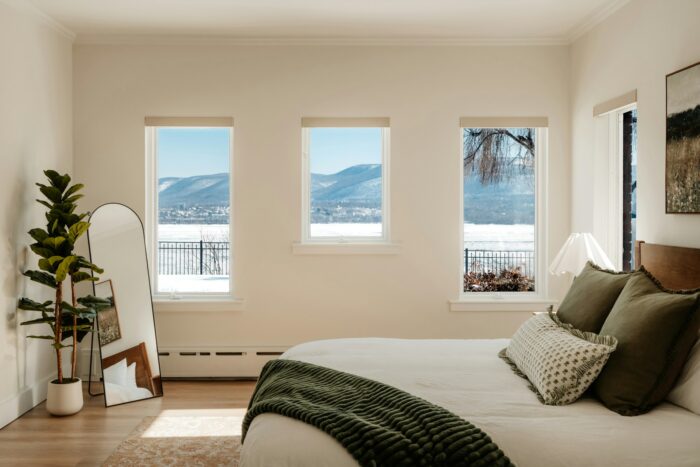 bedroom with a view of snowy mountains through three windows home design bedroom with a view of snowy mountains through three windows