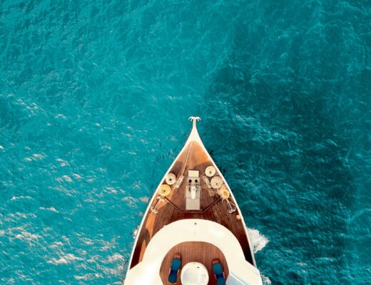 yacht boat in the Indian ocean in the Maldives seen from above