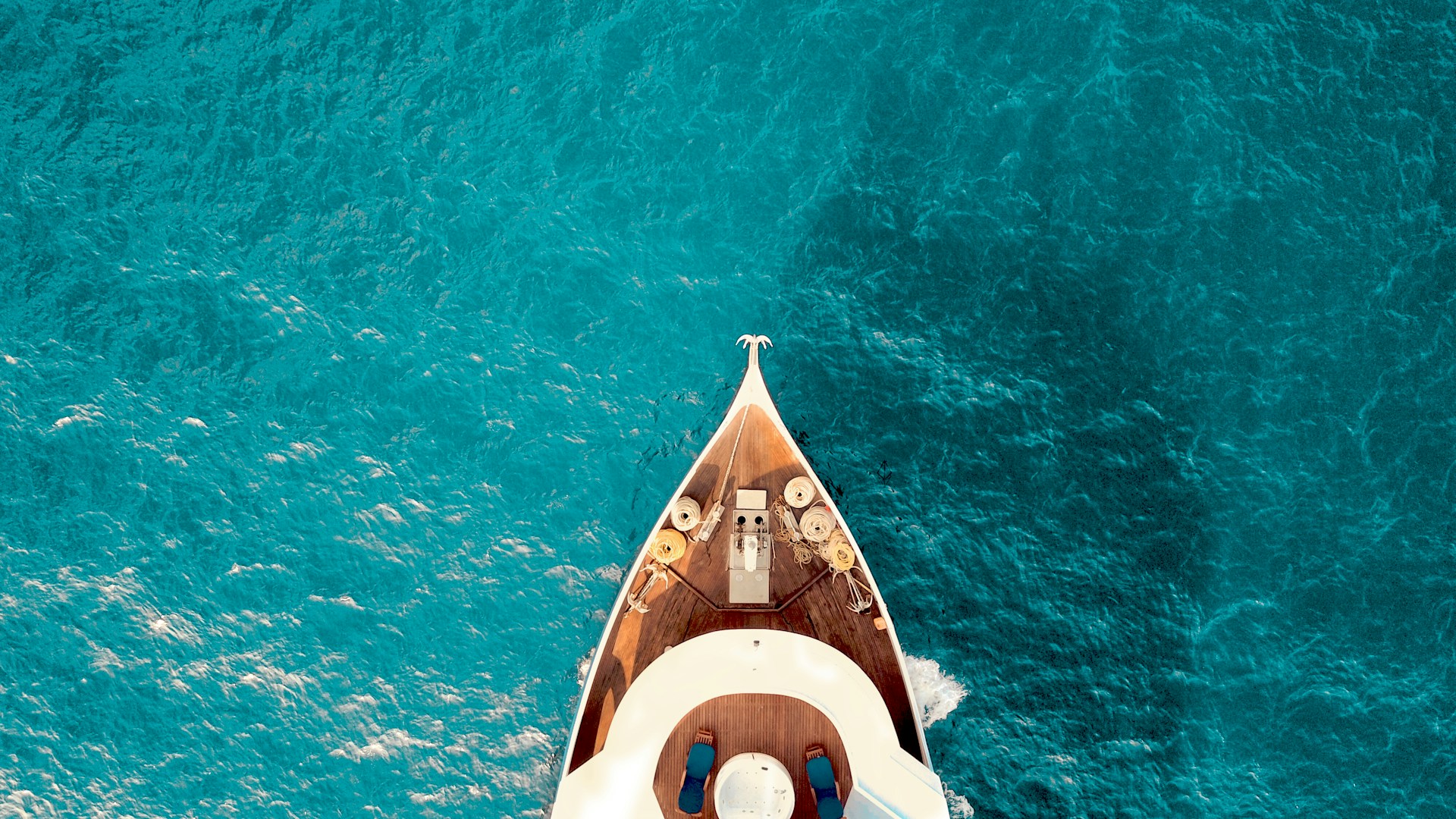 yacht boat in the Indian ocean in the Maldives seen from above