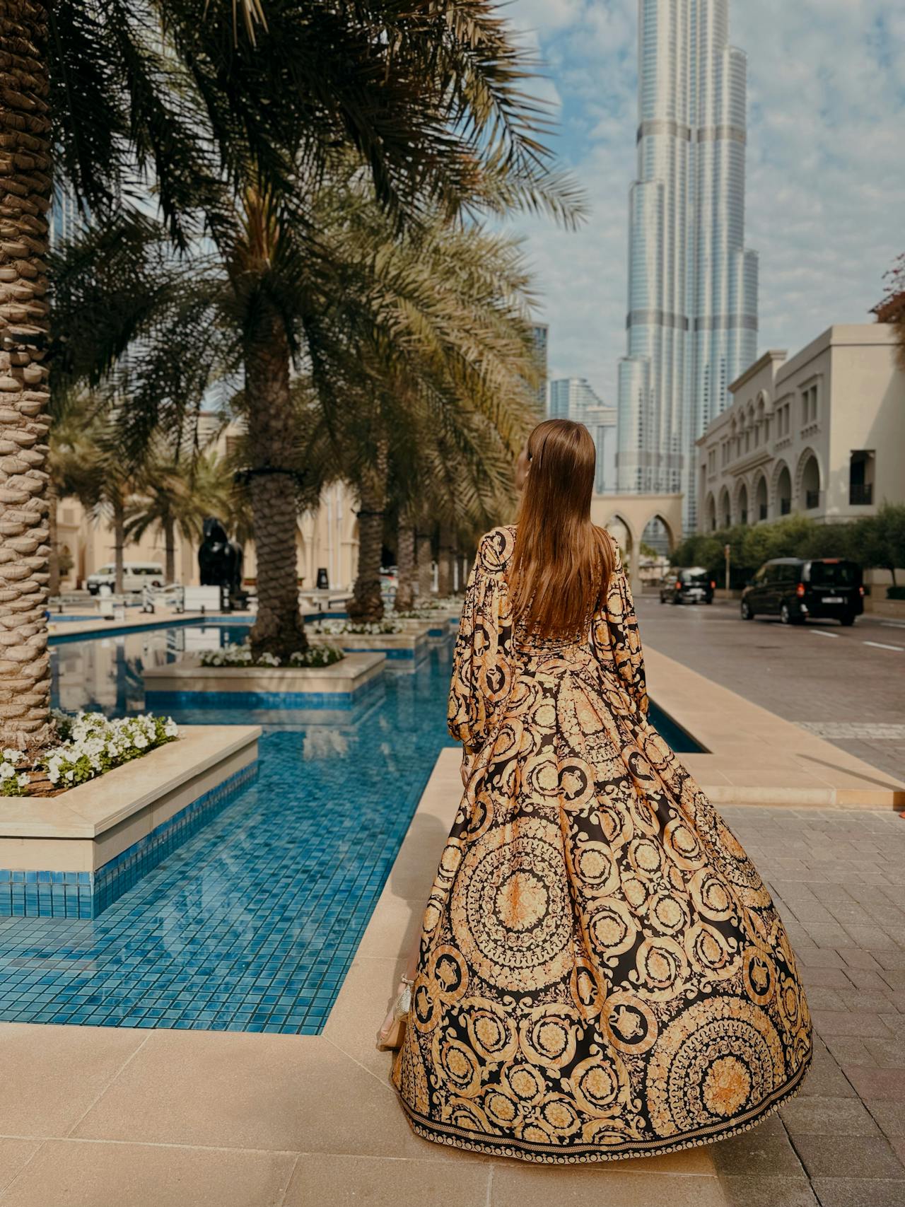 elegant woman in Dubai with Burj Khalifa building