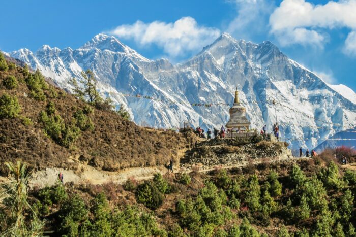 Temple in front of snowy himalaya mountains in Nepal