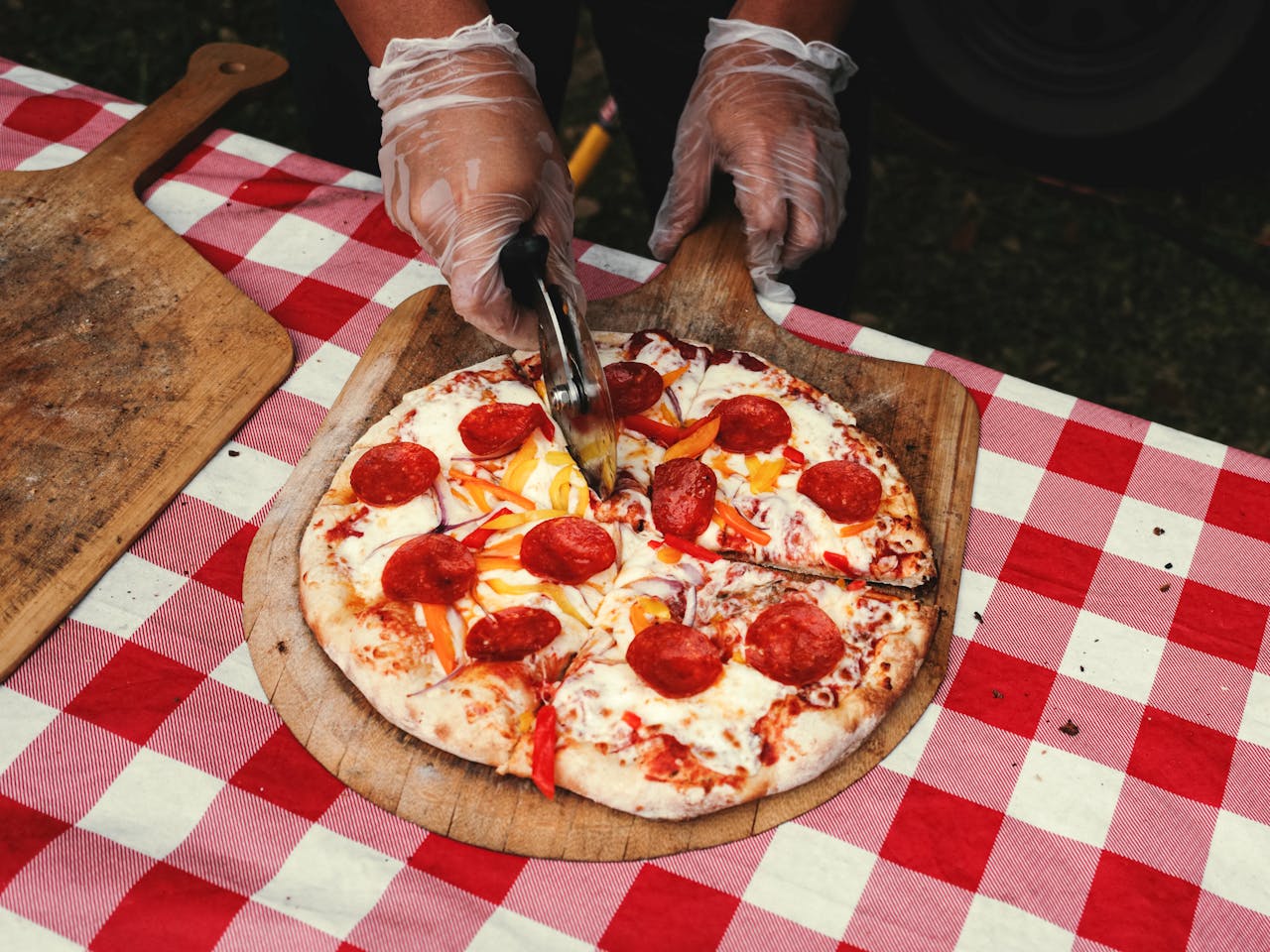 pepperoni pizza slices on a wooden tray in Houston Texas pepperoni pizza slices on a wooden tray in Houston Texas
