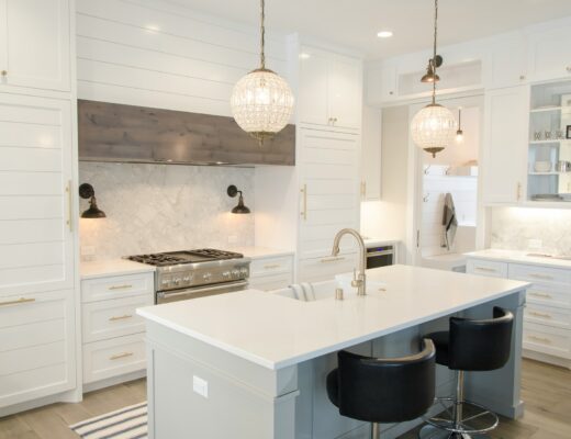white kitchen interior design with gold details