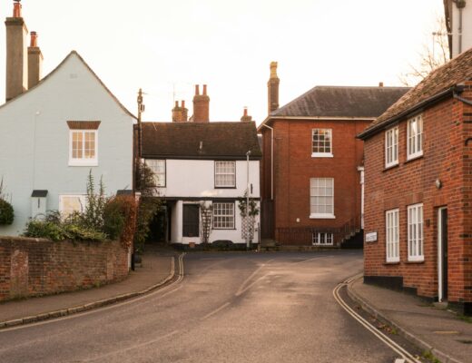 A street with brown and white terraced houses in Manningtree, UK