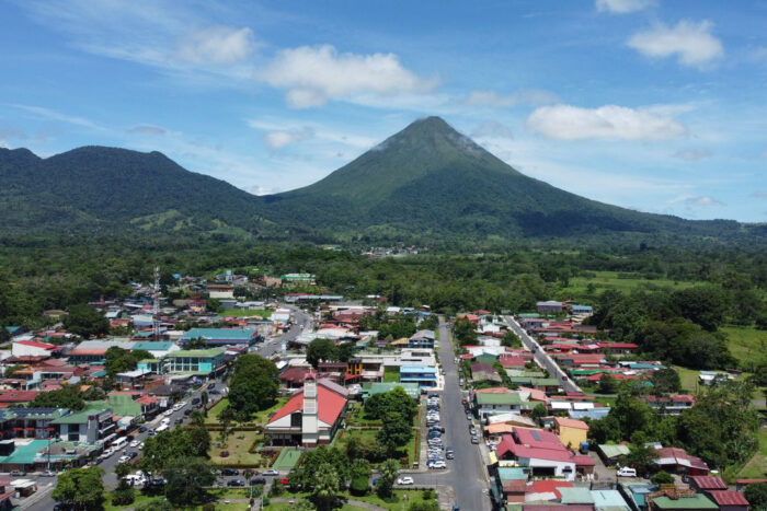 A breathtaking aerial view of La Fortuna with the majestic Arenal Volcano in Costa Rica.